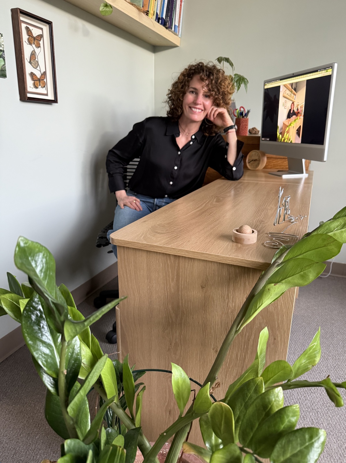 Kate Swartz, PMHNP at her desk in Issaquah, WA